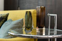 Detail of glass vases on side table