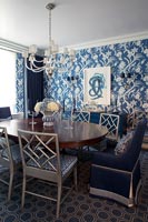 Blue floral wallpaper in the dining room