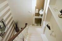 Stairway with cloakroom off landing