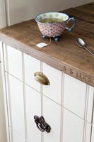 Detail of reclaimed wooden kitchen unit