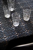 Detail of glasses on dining table