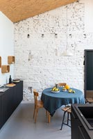 Round table in modern country kitchen-diner