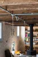 Steel pipes on ceiling with pendant lights