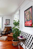 Modern artwork and radiator cover in living room 
