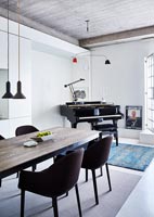 Small grand piano in modern apartment