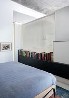 Partition wall in small studio apartment bedroom
