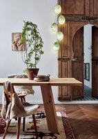 Decorative lights in eclectic dining room