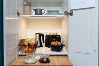 Cupboard with breakfast making facilities