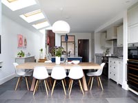 Large dining table in modern kitchen 