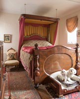 Country bedroom with pet dogs 