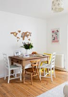 Various chairs around dining table 
