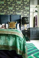 Green and black bedroom