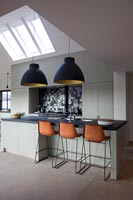 Contemporary kitchen with bar stools 