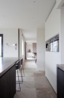 Modern kitchen with stone flooring 