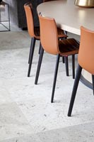 Terracotta coloured dining chairs 