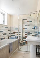Modern bathroom with brick style tiling 