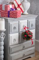 Christmas decorations on chest of drawers 