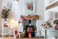 Christmas decorations around fireplace 