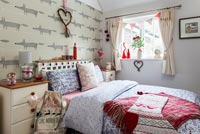 Colourful bedroom decorated for Christmas 
