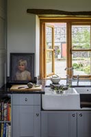 Butler sink in modern country kitchen 
