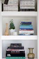 Books and items on built in shelves 