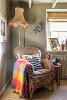 Wicker armchair and standard lamp 