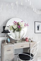 Dressing table in eclectic bedroom 
