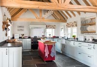 Country kitchen with exposed wooden beams 