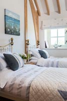 Twin beds in country bedroom 