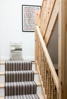 Wooden staircase with carpet 