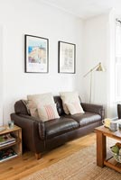 Vintage leather sofa in modern living room 