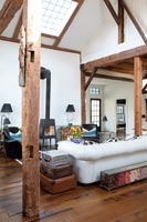 Modern country living room with exposed wooden beams 