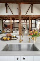Modern kitchen sink in large open plan country living space 