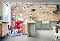Contemporary kitchen with childrens play area 