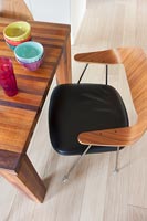 Black and wooden chair in modern dining room 