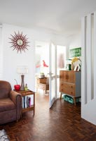 Retro living room with starburst wall clock 