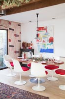Modern dining room with designer furniture at Christmas