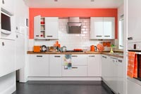 White and orange modern kitchen 