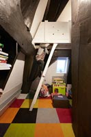 Child climbing ladder in modern bedroom - Coonverted C16th Dutch Windmill 