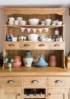 Bunting on traditional country wooden dresser 