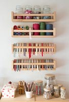 Shelves of sewing equipment, thread and ribbon 