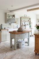 Island in modern country kitchen - decorated in muted tones 