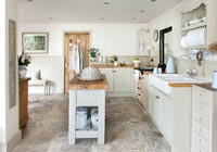 Modern country kitchen decorated in muted tones 