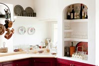 Country kitchen with alcove shelving 