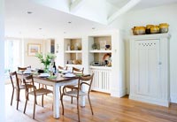 White and wooden modern dining room 