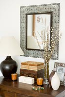 Mirror and accessories on cabinet