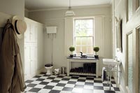 Classic bathroom with black and white checked floor 