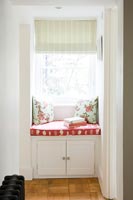 Window seat with built-in cabinet 