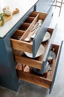 Open drawers in modern kitchen island 