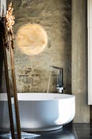 Luxury bathroom with moon style pendant light 